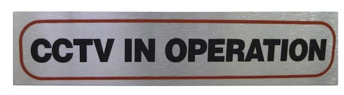 CCTV Operation Sign - High Brushed Metallic Adhesive 17x4cm