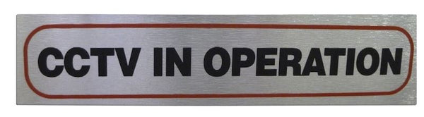 CCTV Operation Sign - High Brushed Metallic Adhesive 17x4cm